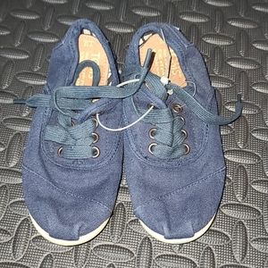 Never worn kids Toms!